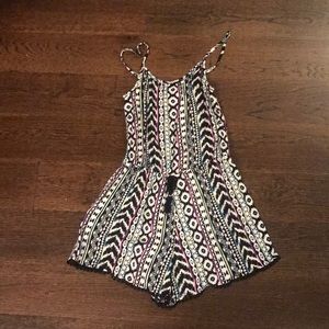 Cute black romper with patterns
